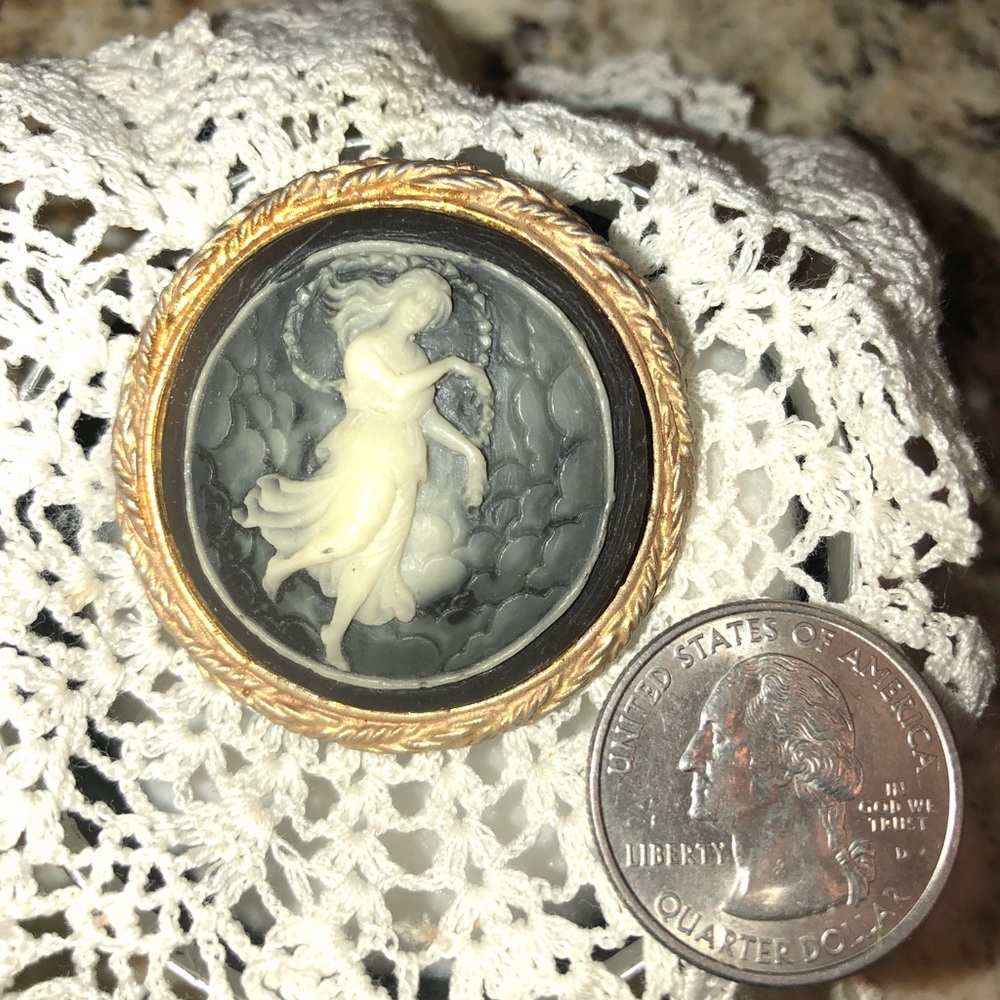 Round vintage cameo brooch